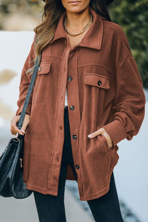 Fleece shirt jacket in Caramel with patch pockets and button front.