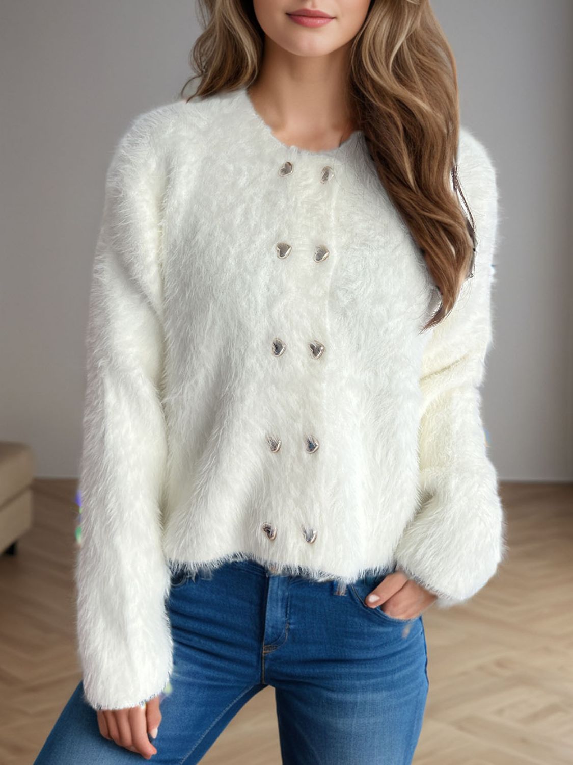 White fluffy double-breasted knit cardigan with silver buttons and crew neck.
