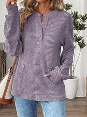 Lavender ribbed long-sleeve top with button detail and pocket