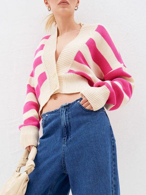 Cropped pink and cream stripe knit cardigan with V-neck and button front detail.