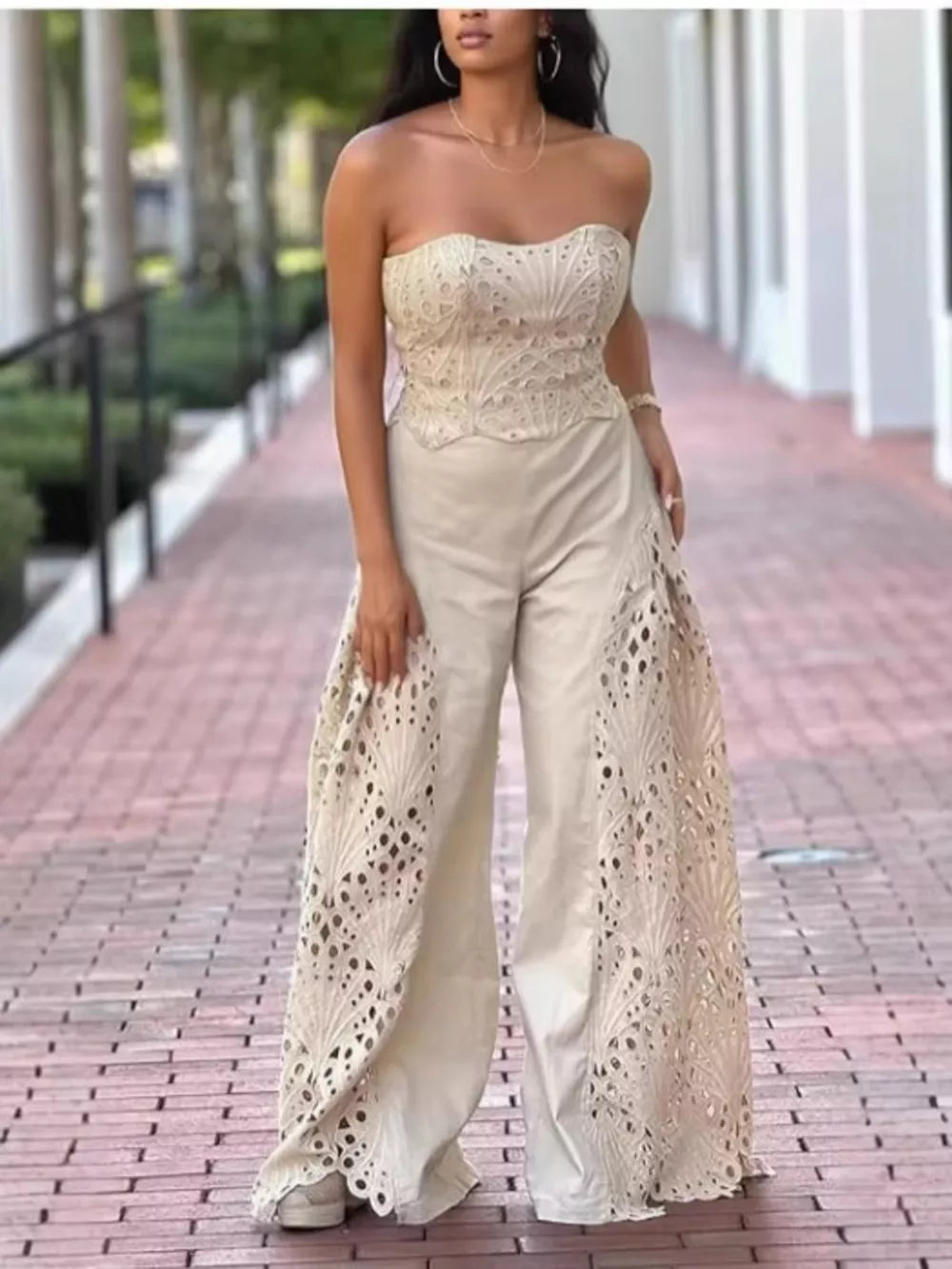 Apricot openwork strapless corset top and wide-leg pants set with intricate detailing.