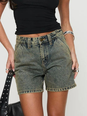 Utility denim carpenter shorts in a distressed blue wash with a relaxed fit.