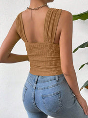 Textured crinkle strap crop top in camel with ruched detail.
