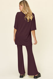 Deep Red oversized tee and flare leg set from behind, casual loungewear.