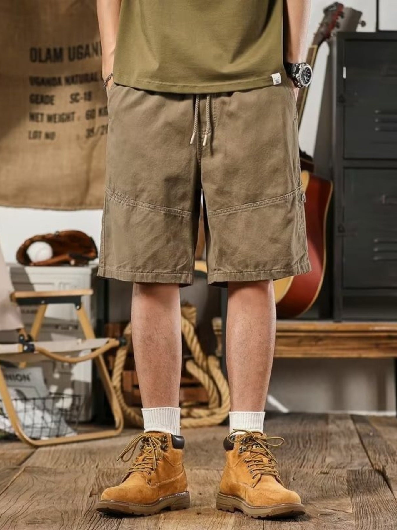 Men's taupe drawstring shorts, relaxed fit, casual style with detailed stitching.