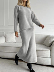 Gray textured knit co-ord set with relaxed fit sweater and midi skirt.