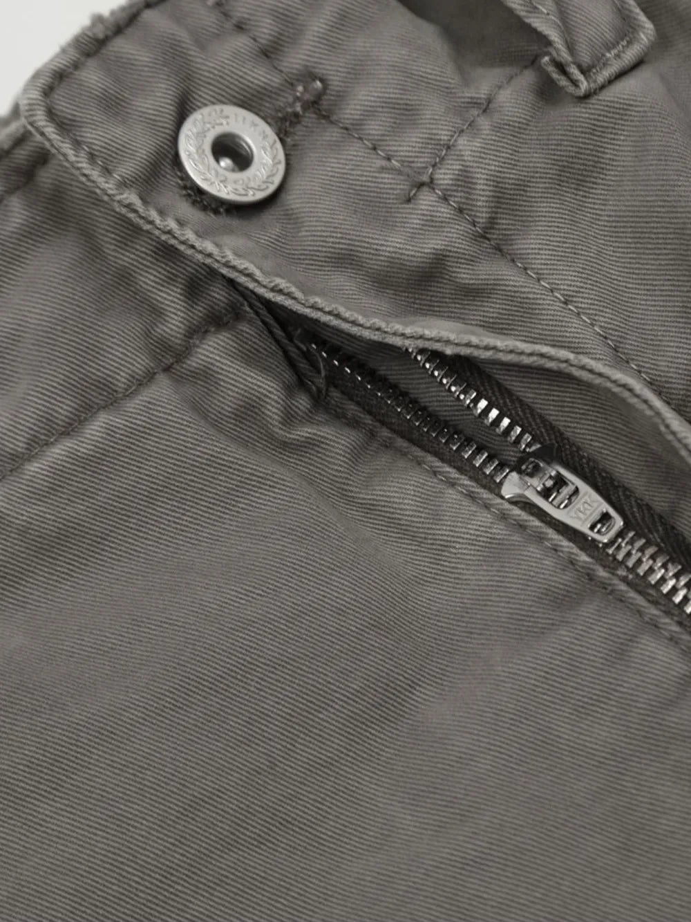 Gray utility cargo pants with distressed fabric detail and silver zipper.