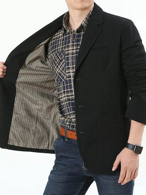 Black cotton button-up blazer with striped lining and chest pocket detail.