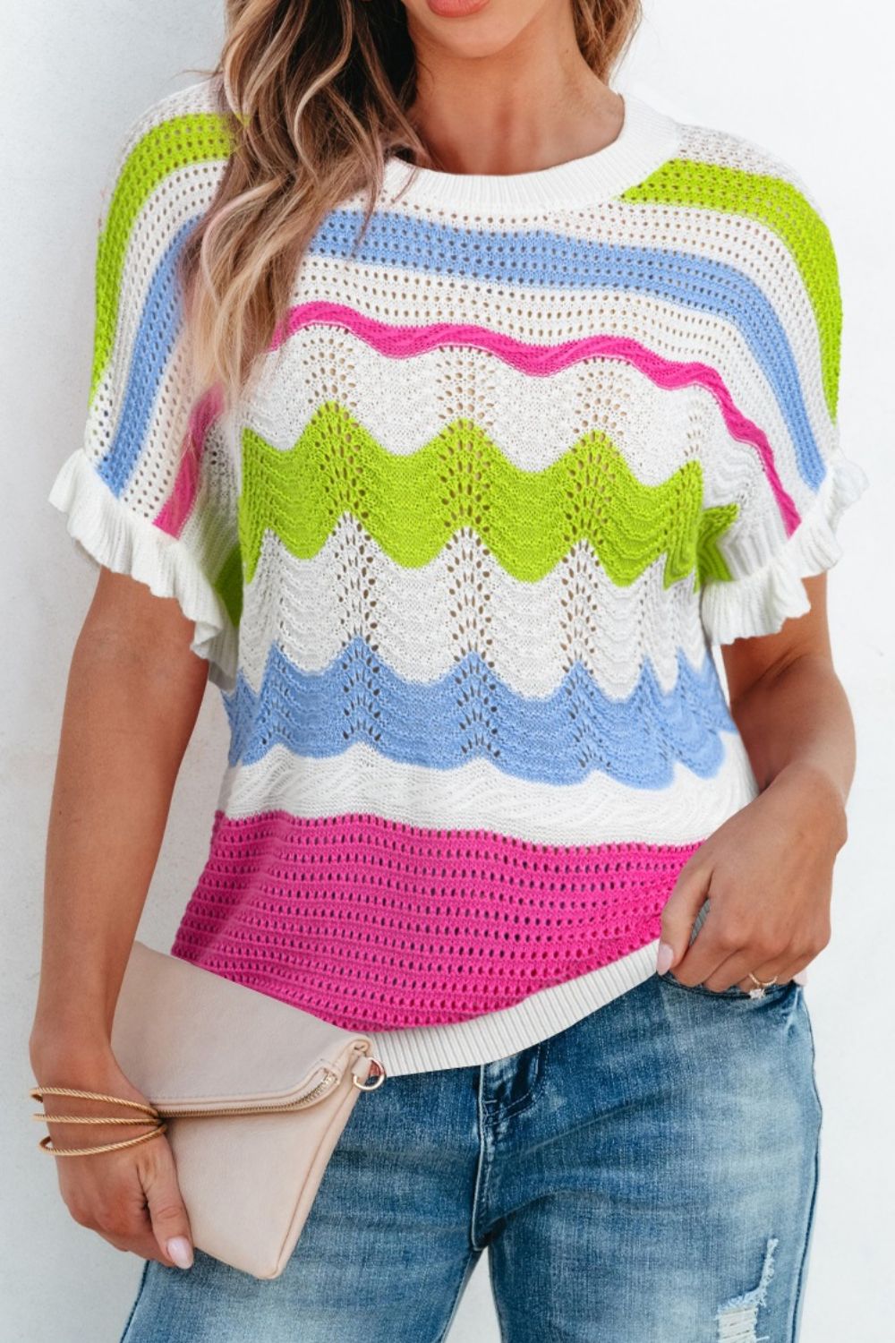 Scalloped crochet tee with ruffle sleeves in stripe pattern.