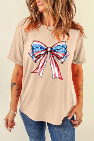 Eggshell t-shirt with a watercolor American flag bow graphic.