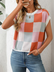 Checkerboard knit cap sleeve top in pink, orange, blue, and white.