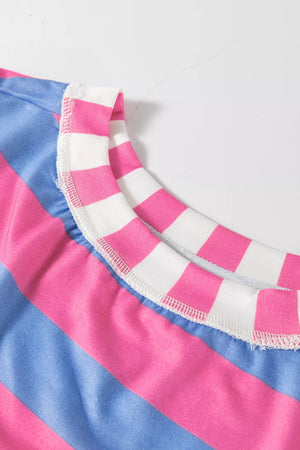 Overshirt with pink and blue stripes, white contrast collar, and raw edge detail.