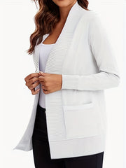 White textured knit open-front cardigan with ribbed trim and pockets.