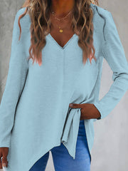 Pastel blue ribbed knit tunic with V-neck and asymmetric hem