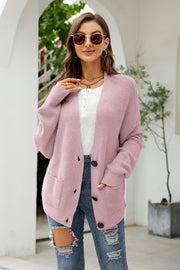 Waffle knit oversized cardigan in carnation pink with button front and pockets.