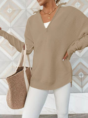 Camel ribbed knit pullover sweater with funnel neck and quarter zip, long sleeves.
