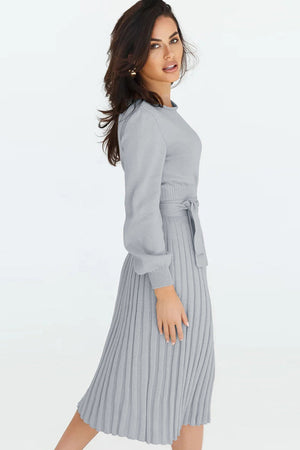 Belted knit midi dress in light gray with long sleeves and a pleated skirt.
