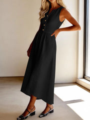 Black sleeveless midi dress with button front and A-line skirt.