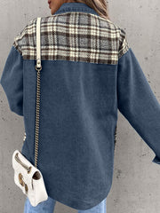 Denim jacket with plaid paneling on shoulders, long sleeves, buttoned front, in dusty blue.