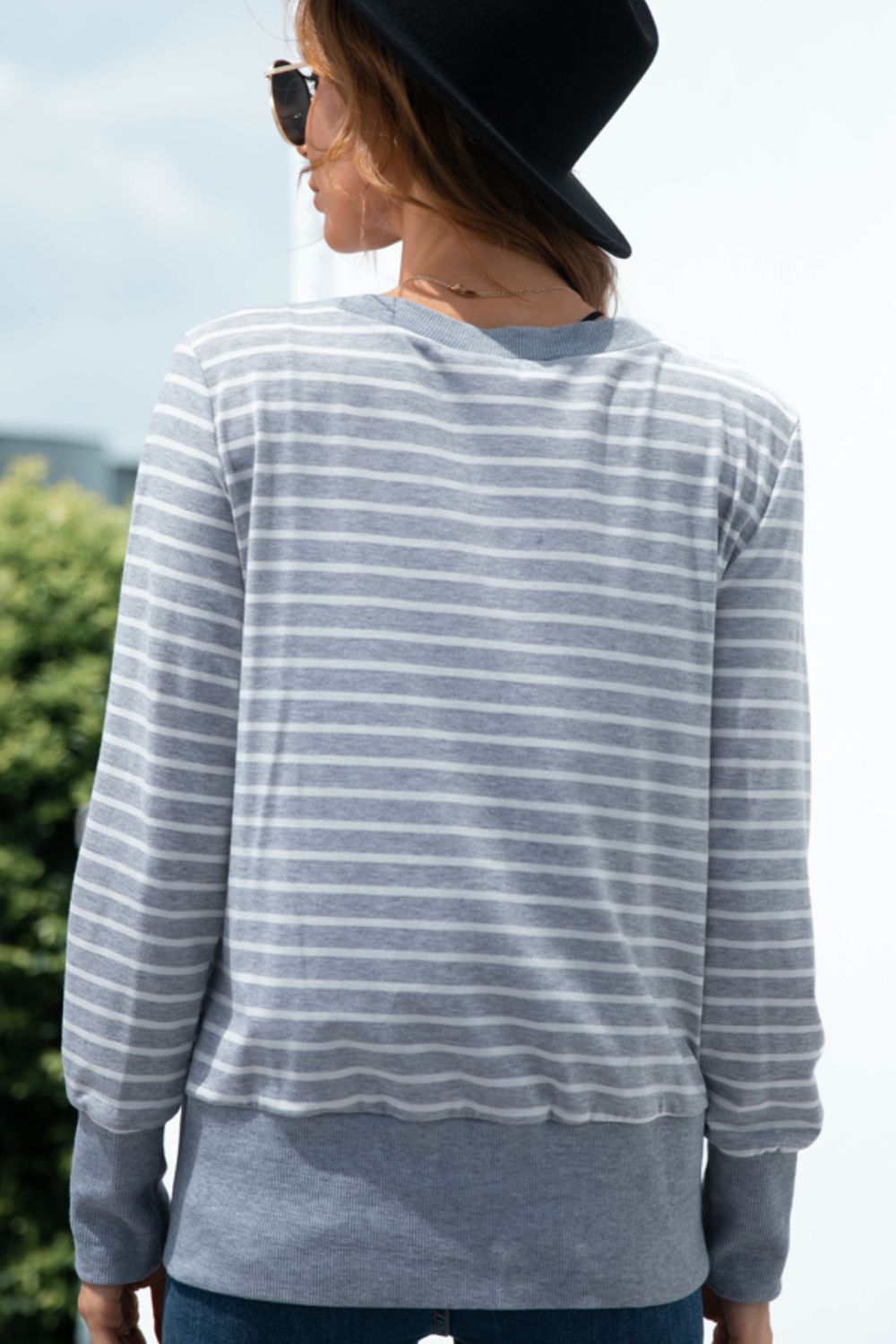 Button-front cardigan in Cloudy Blue with white stripes and ribbed trim.