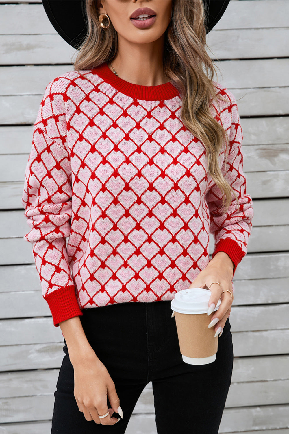 Heart grid crewneck knit sweater in pink and red acrylic with a diamond pattern.