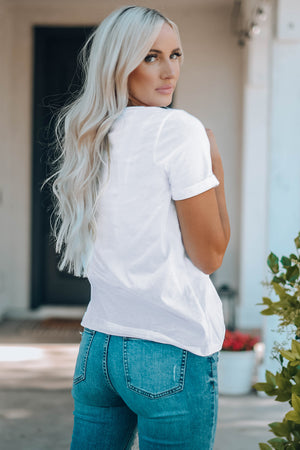 White t-shirt with cuffed short sleeves, casual basic style, 70s-inspired graphic tee.