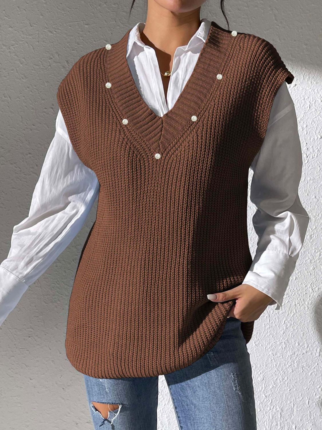 Brown ribbed knit sleeveless v-neck vest with pearl embellishments