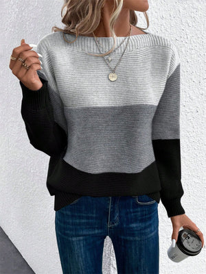 Colorblock boatneck knit sweater in black, gray, and white acrylic with a relaxed fit.