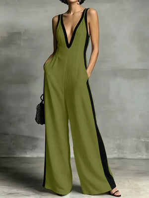 Olive wide-leg jumpsuit with deep V-neck and contrast trim, sleeveless, with pockets.