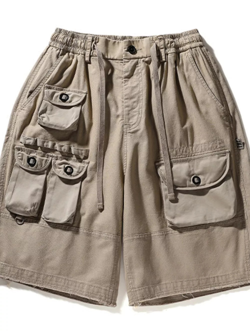 Khaki men's cargo shorts with multiple utility pockets and drawstring waist.