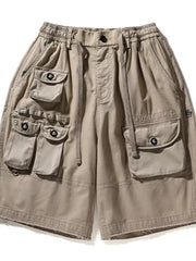 Khaki men's cargo shorts with multiple utility pockets and drawstring waist.