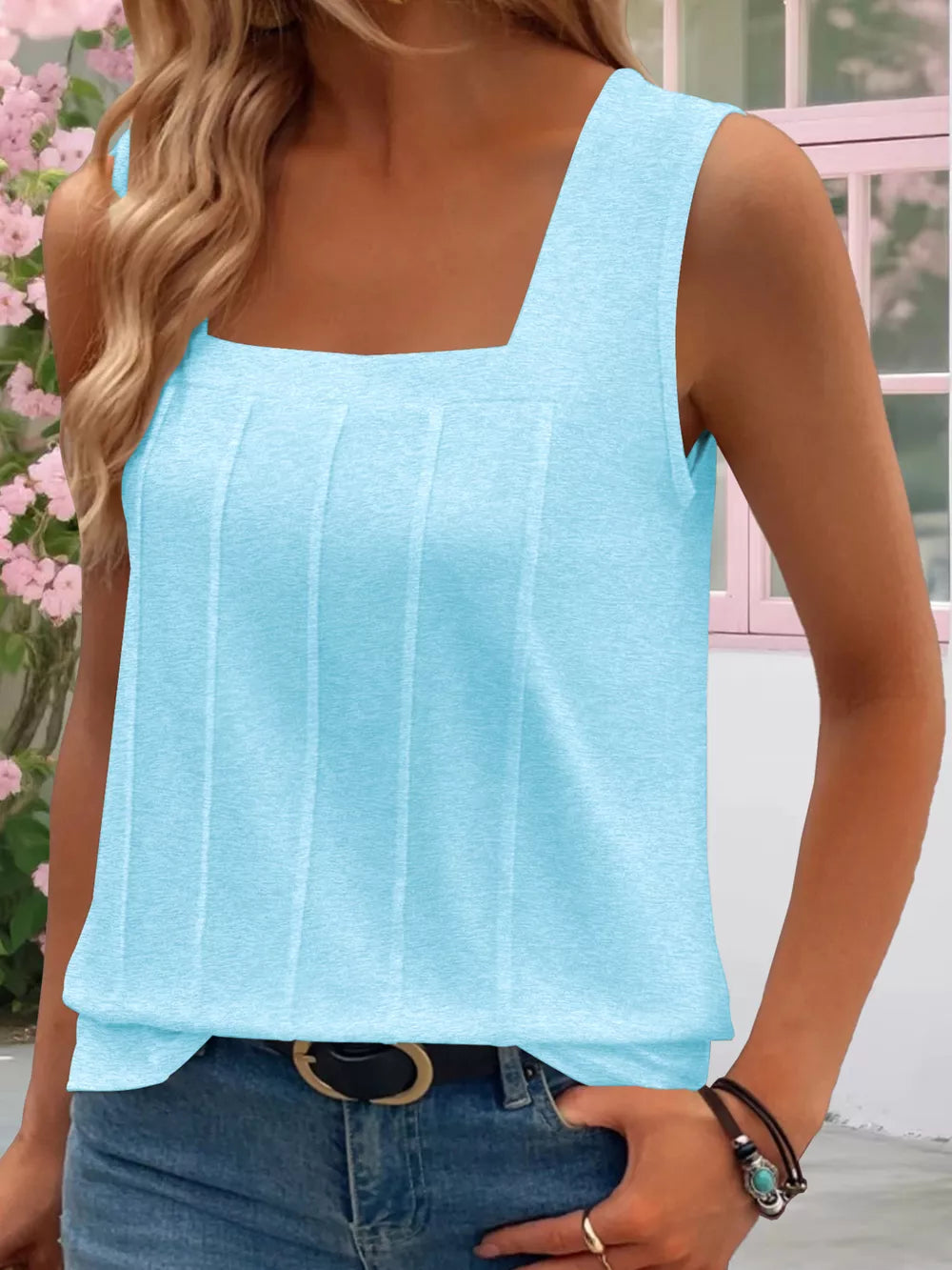 Sky blue tank top with square neckline and vertical pintuck details.