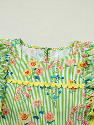 Green striped cotton blouse with floral print, ruffle sleeves, and yellow trim.