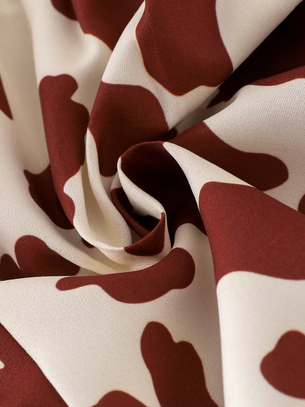 Children's Cow Print Ruffle Jumpsuit in Brown And White, product detail