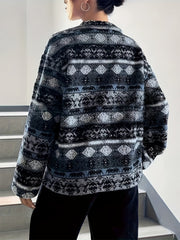 Textured Aztec zip-up fleece jacket in dark blue with a full pattern.