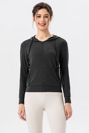 Black activewear hoodie with drawcord sides and pockets, full zip, long sleeves.