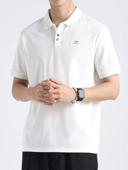 White textured cotton polo shirt with button accents and a subtle logo detail.