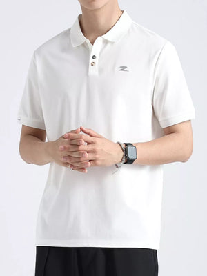 White textured cotton polo shirt with button accents and a subtle logo detail.