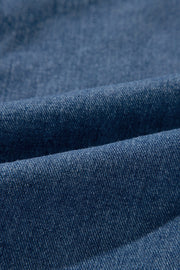 Medium wash denim blazer fabric detail