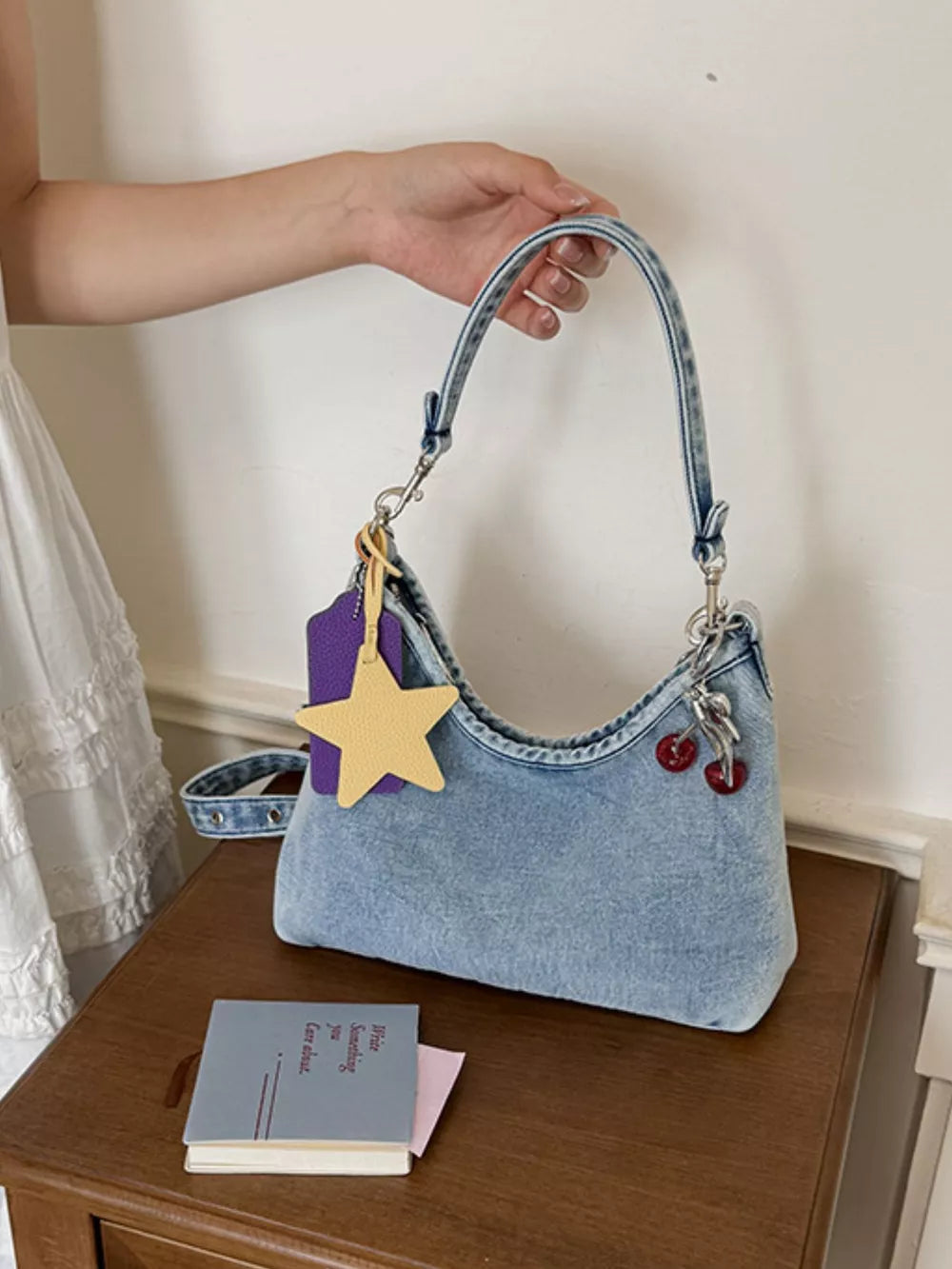 Star Charm Denim Shoulder Bag in Medium, editorial view