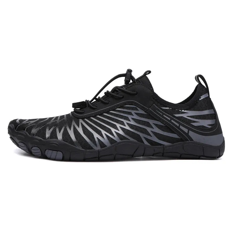 Black adaptive mesh trail runners with grey geometric pattern and quick lace.