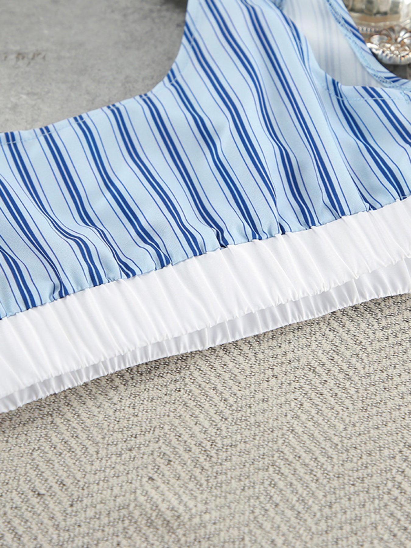 Blue striped cami with white ruffled hem detail