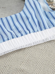 Blue striped cami with white ruffled hem detail