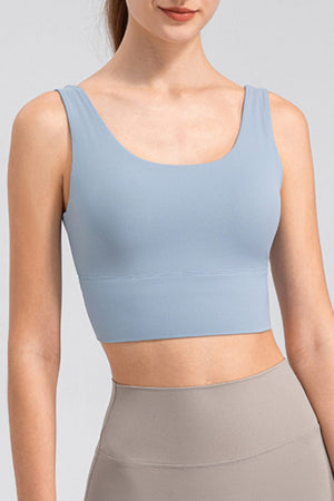 Light blue performance crop top with scoop neck and wide band