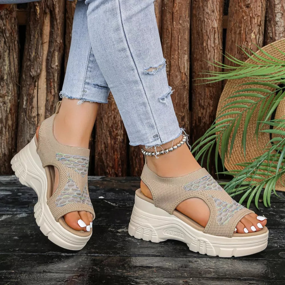 Khaki open-toe platform sandals with geometric pattern knit upper and chunky sole.
