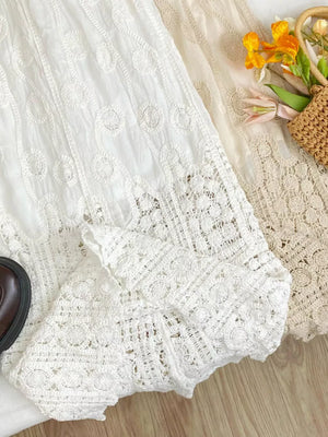 White lace midi skirt with crochet detail and elastic waist