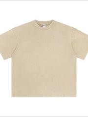 Oversized beige acid wash tee with crewneck and short sleeves.