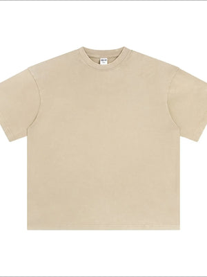 Oversized beige acid wash tee with crewneck and short sleeves.