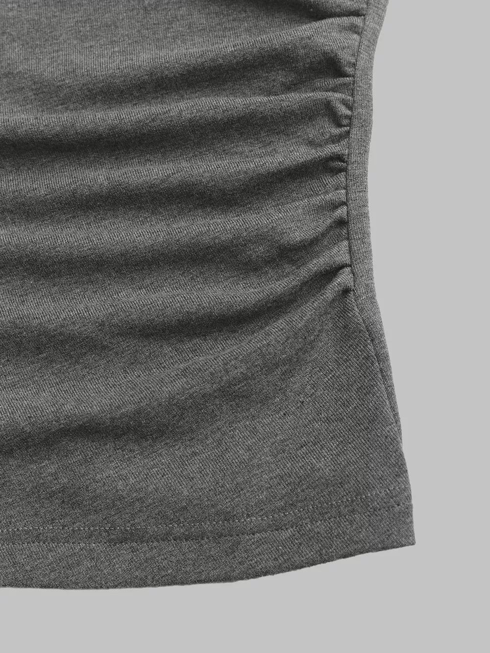Grey two-piece set with ruching detail and drawstring.