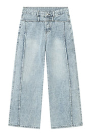 Light wash denim wide-leg jeans with vertical seams and a casual cut.
